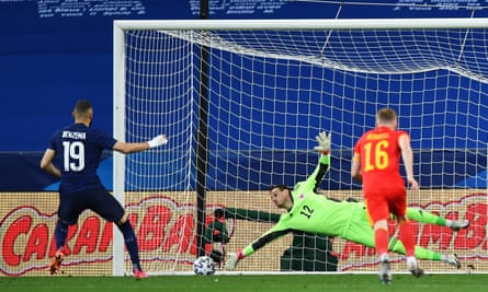 Karim Benzema’s penalty is saved by Danny Ward.