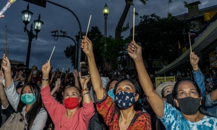 Photograph: Sopa/Rex/Shutterstock Image of Thai protesters with Wands Up Harry Potter gesture from The Guardian