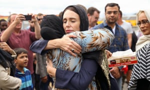 Ardern hugs a visitor at the Kilbirnie mosque after the Christchurch attacks