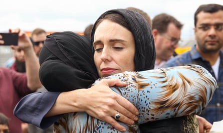 New Zealand prime minister Jacinda Ardern hugs a mourner at the Kilbirnie mosque in Wellington.