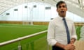 Rishi Sunak speaks during a TV interview on a visit to Crystal Palace football club.