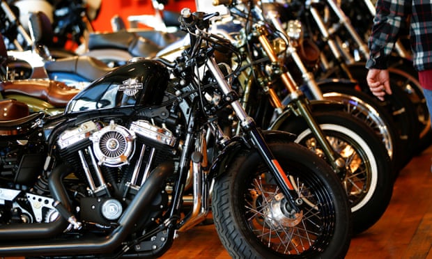 Harley-Davidson motorcycles are displayed for sale at a showroom in London on Friday. They could be significantly more expensive if China and the EU go ahead with planned retaliatory tariffs.