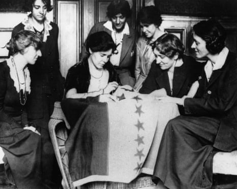 Alice Paul, seated second from left, sews the 36th star on a banner, celebrating the ratification of the women’s suffrage amendment in August 1920. 