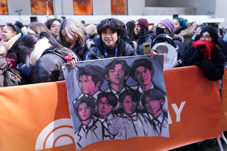 a person holding a poster