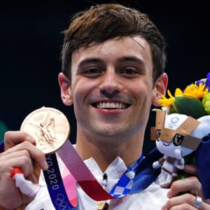 Tom Daley with his Olympic gold medal.