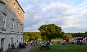 People outside the mansion