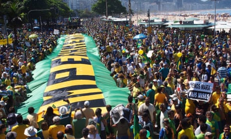 Demonstrators take part in a protest against the corruption scandal in Petrobras, growing economic hardship and in demand of the impeachment of Brazil’s president, Dilma Rousseff.