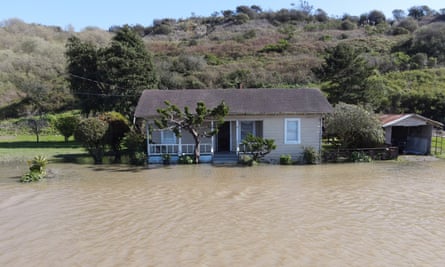 Floodwaters from the Pajaro River inundate residents after days of heavy rain.