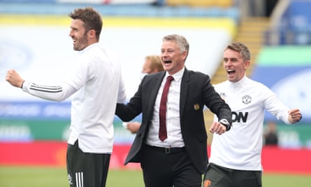 Michael Carrick, Ole Gunnar Solskjær and Kieran McKenna celebrate a Manchester United victory against Leicester in July 2020