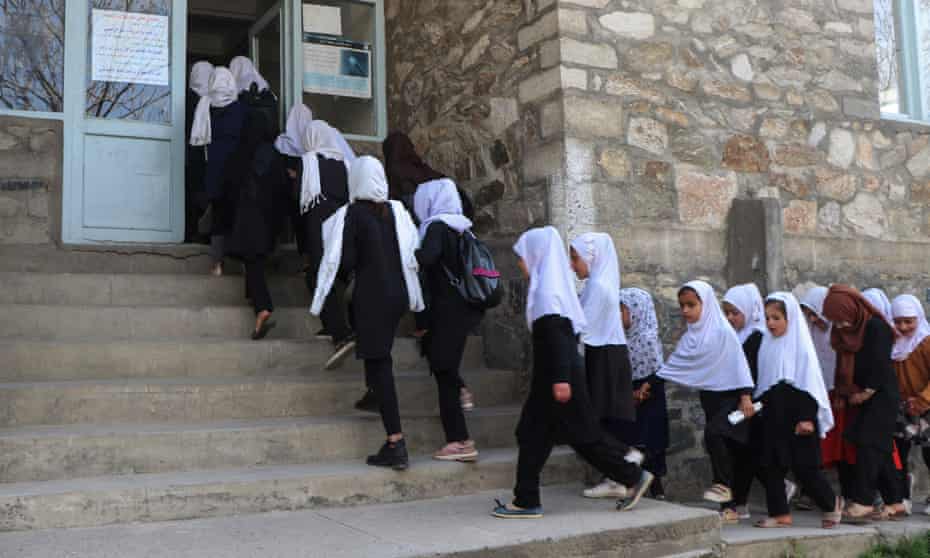 Girls arrive at their school in Panjshir