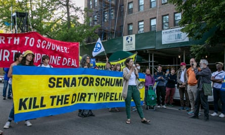 Protesters show their disapproval outside the Brooklyn home of Chuck Schumer, the Senate majority leader.
