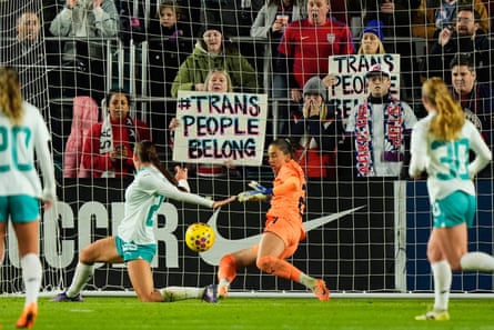 A shot kicked by United States guardant Catarina MacArio (20) gets past New Zealand defender Mackenzie Barry, halfway left, and goalkeeper Victoria Esson, halfway right, for a extremity during Wednesday’s first half.