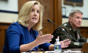 US Army Secretary Christine Wormuth (in a blue top) and US Army Chief of Staff General James McConville (in green military uniform) appear sat down before the House Armed Services Committee hearing in June.