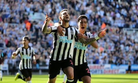 Joselu celebrates scoring Newcastle’s opening goal against West Ham with Mikel Merino.