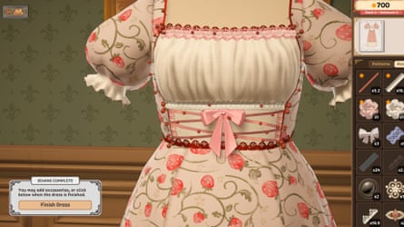 A white dress, with pink bow and frills, and a flower pattern on the material.