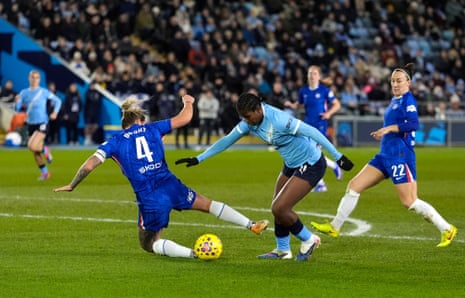 Chelsea's Millie Bright (left) is beaten Manchester City's Khadija Shaw but she can’t capitalise on the chance.