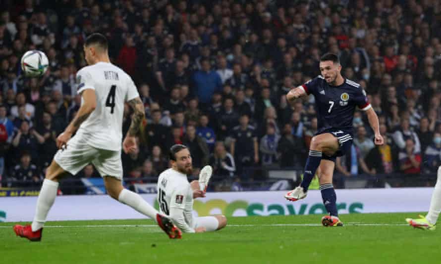 John McGinn picks out the top corner for Scotland’s first.