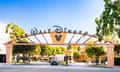 Entrance to Walt Disney Studios and Headquarters in Burbank, California. Under an arch leads to a wide driveway with the words