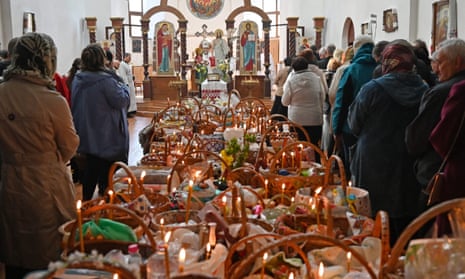 Believers attend an Easter service at St. Demetrius Church of the Ukrainian Greek Catholic Church in Kharkiv.