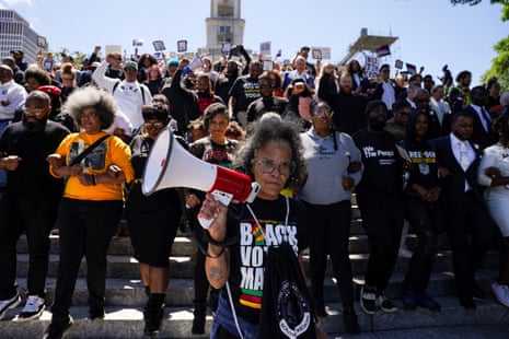 Demonstrators walk down stairs outside the Tennessee state Capitol following passage of the new congressional map on 7 May 2026.