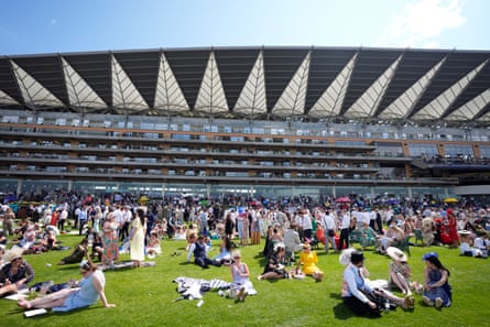 Racegoers relaxing on day four of Royal Ascot this year.