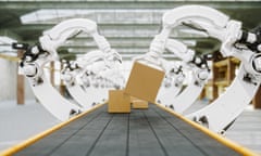 Robot arms putting boxes on a conveyor.