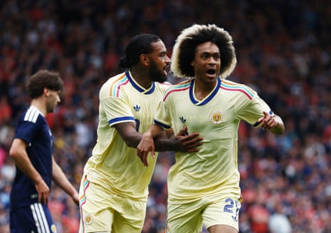 Chong celebrates with Jurgen Locadia.