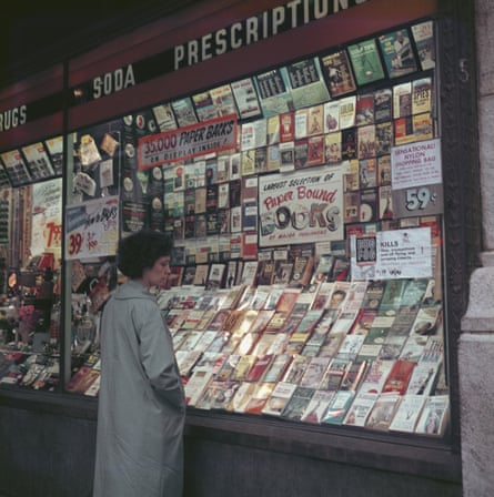 Paperback books in the window of a drugstore in New York City, circa 1961
