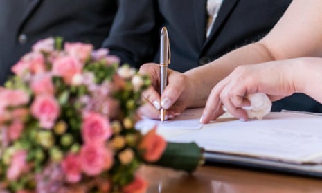 bride signs register
