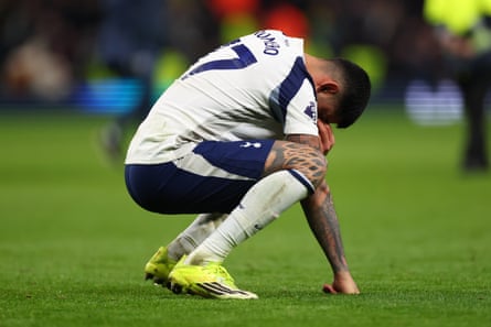 Cristian Romero on his haunches at full time.