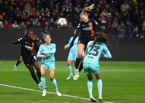 Eintracht Frankfurt’s Laura Freigang heads home to open the scoring against Barcelona.