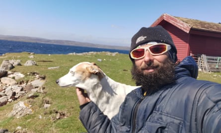 Chris Lewis and his dog, Jet, on Hildasay