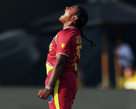 West Indie's Ashmini Munisar celebrates after taking the wicket of England's Sophia Dunkley.