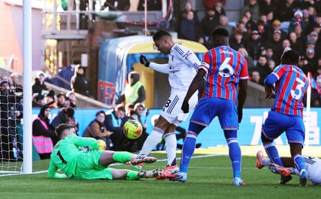 Dean Henderson makes a fine stop from Casemiro.