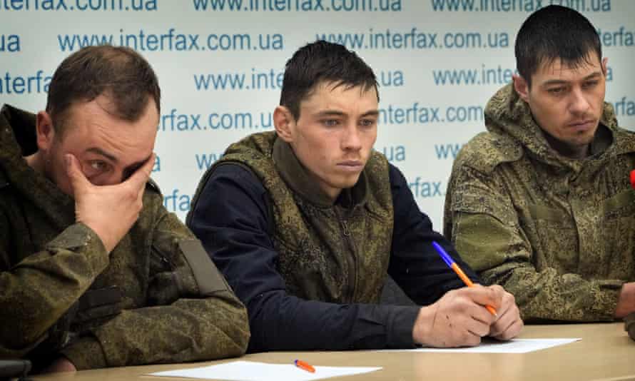 Captured Russian soldiers in Kyiv, Ukraine. Experts say it is difficult to link atrocities up the chain of command, but Putin is ‘leaving lots of footprints’.