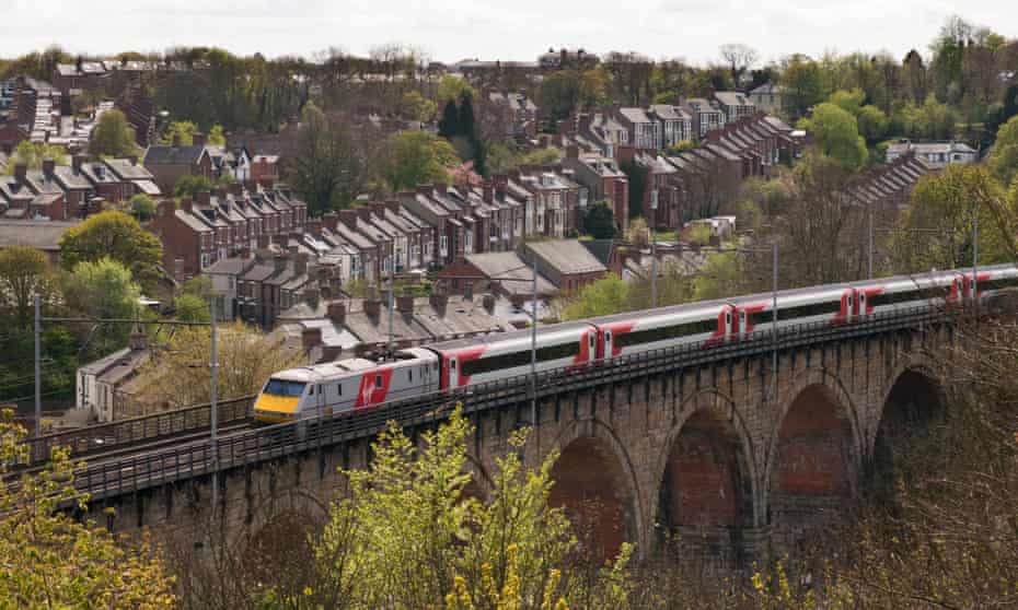 A Virgin Trains East Coast mainline train crossing Durham viaduct in north-east England.