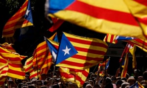 Demonstrators wave the Catalan ‘estelada’ in Barcelona.