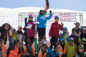 Nazira (centre) stands on the podium after winning the Women’s Afghan Ski Challenge in March last year.