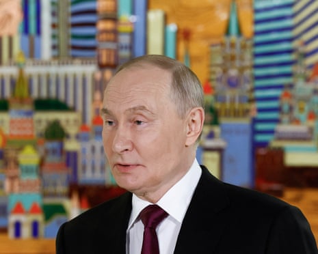 Russian president Vladimir Putin speaks with journalists as he attends the VTB Investment Forum in Moscow, Russia.