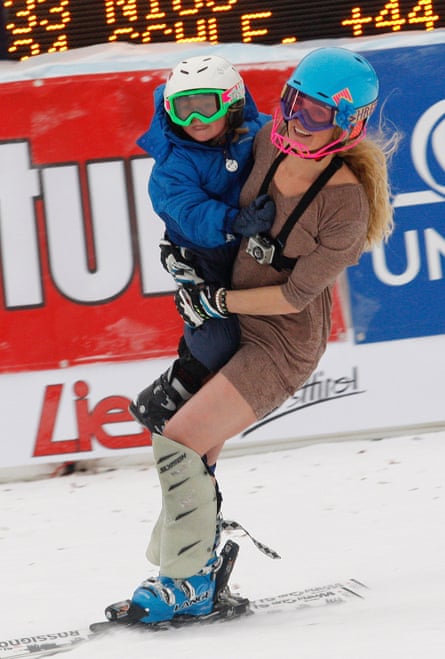 Sarah Schleper holds her son Lasse in a December 2011 World Cup slalom event in Austria