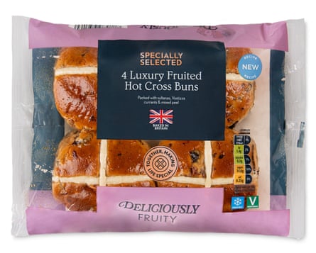 Four Aldi specially selected luxury fruited Hot Cross Buns in a packet