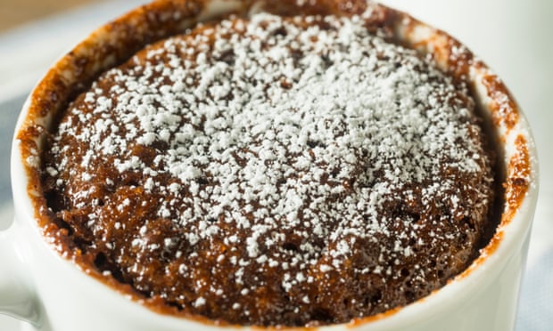 A microwavable chocolate brownie in a mug