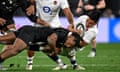 England’s Marcus Smith is tackled by New Zealand’s Sevu Reece during the first Test in Dunedin last Saturday.