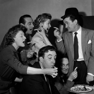 The stars of the television show The Idiot Weekly, Price 2d; June Whitfield, Max Geldray, Pattie Lewis, Graham Stark; and, sitting, Peter Sellers and Kenneth Connor; take a chip break