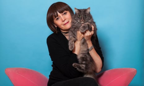 Britt Collins holding a cat