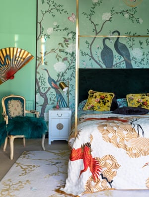 A taste of the east: chinoiserie on the walls and textiles in the bedroom.