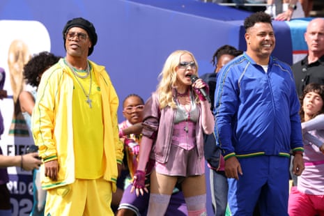 Ronaldinho, Madonna and Ronaldo perform during the half-time show