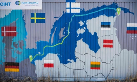 A corrugated metal container decorated with a painted map showing the route of the Nord Stream 2 gas pipeline between Russia and Germany.