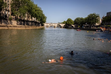 Paris mayor Anne Hidalgo swims in the Seine.