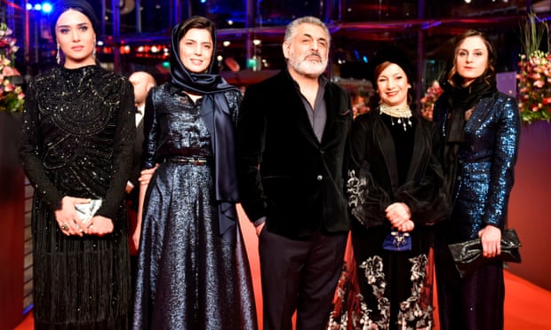 Mani Haghighi, centre, with the cast of Pig at the 2018 Berlin film festival.